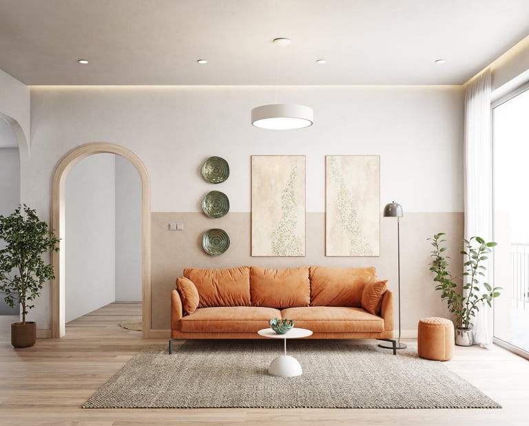 Cozy living room with warm wood flooring and orange sofa
