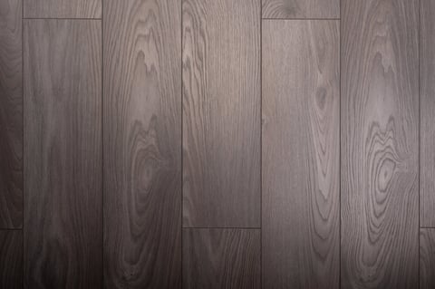 Charcoal grey wood grain laminate texture