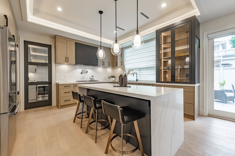 Beautiful kitchen interior with hardwood floors and white cabinets