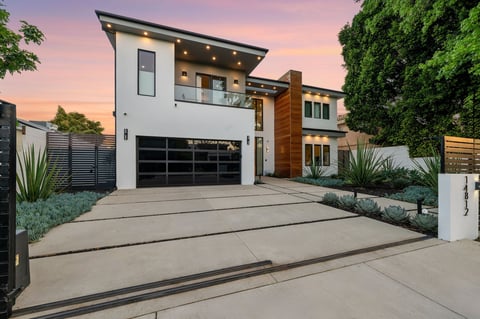 Luxury home with pool showcasing renovation value