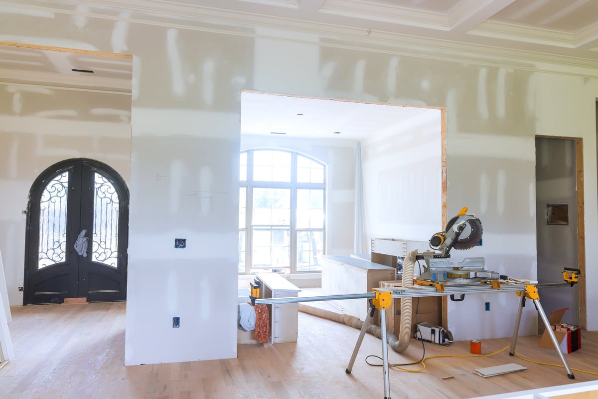 Modern living space mid-renovation, showcasing whole-home remodeling work