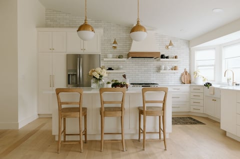 Modern kitchen renovation with white cabinets